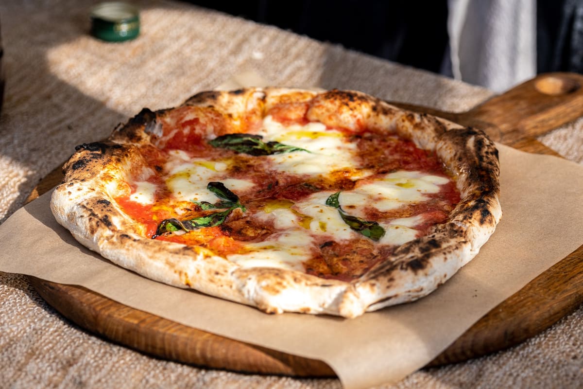 Rustic Grille pizza and Italian food ready for delivery